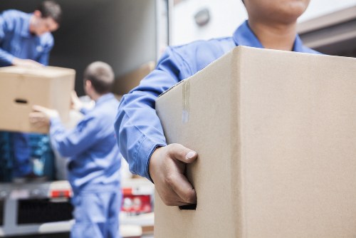 Packing boxes and moving supplies prepared for a Clapton home move