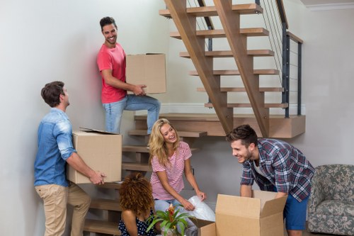 Moving team preparing items safely for loading