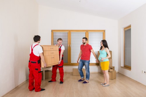 Man And Van Clapton team preparing items safely for transport
