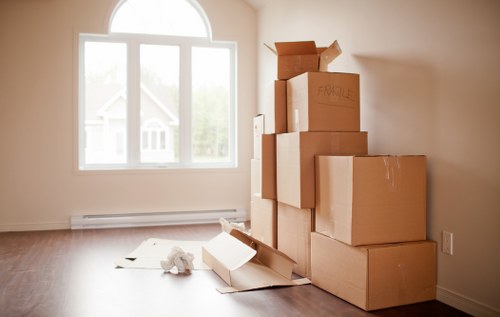 Packed moving boxes ready for a man and van service in Clapton