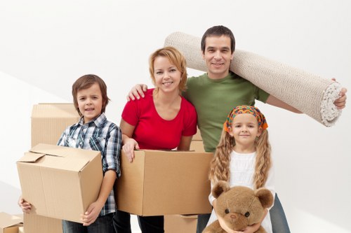 Removal team helping with a house move in Clapton