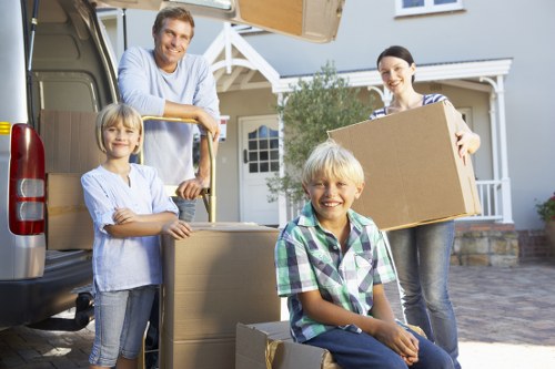 Professional movers handling office furniture during a Clapton relocation
