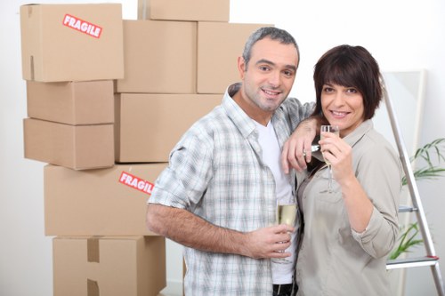 Loading furniture and boxes into a van during a Clapton relocation